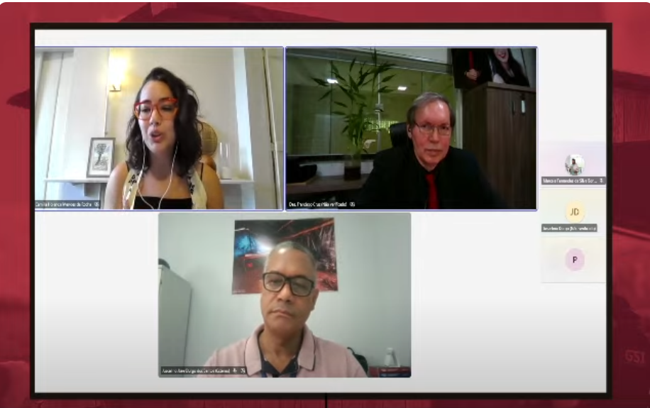 Fotografia com 2 homens e 1 mulher em uma reunião acerca da discussão sobre os desafios no combate ao Trabalho Escravo no TRT-14.