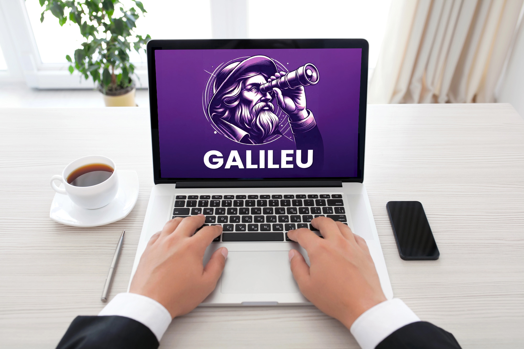 Imagem de duas mãos sobre o teclado de um notebook, aberto na tela Galileu. 